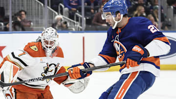 Oct 29, 2024; Elmont, New York, USA;  Anaheim Ducks goaltender Lukas Dostal (1) defends against a shot on goal attempt by New York Islanders center Kyle Palmieri (21) in the second period at UBS Arena. Mandatory Credit: Wendell Cruz-Imagn Images