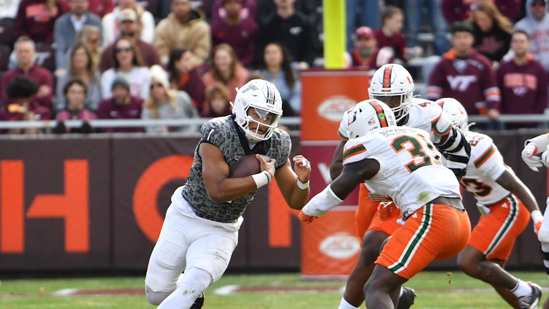 Nov 22, 2025; Blacksburg, Va.; Virginia Tech quarterback Kyron Drones (1) runs the ball against Miami.