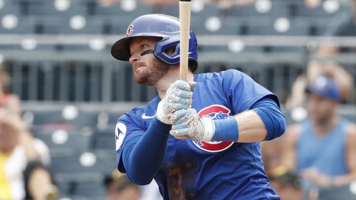 Chicago Cubs left fielder Ian Happ (8) hits an RBI single against the Pittsburgh Pirates during the ninth inning at PNC Park. Chicago won 14-10 on Aug 28.