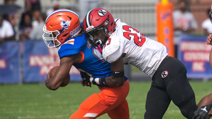 Bartow running back Traveon Hymes is tackled by a Kathleen defender on Saturday morning at Bartow Memorial Stadium. Bartow running back Traveon Hymes is tackled by a Kathleen defender on Saturday morning at Bartow Memorial Stadium.