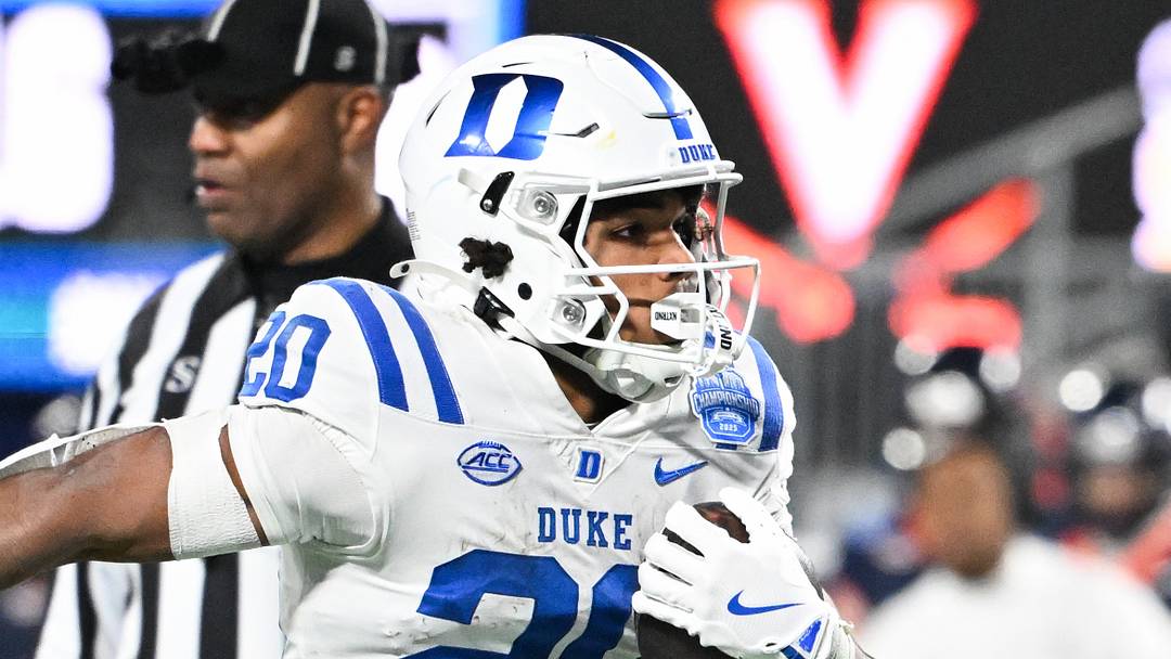 Dec 6, 2025; Charlotte, NC, USA; Duke Blue Devils running back Nate Sheppard (20) runs the ball for a touchdown in the second quarter against the Virginia Cavaliers during the 2025 ACC Championship game at Bank of America Stadium. Mandatory Credit: Bob Donnan-Imagn Images