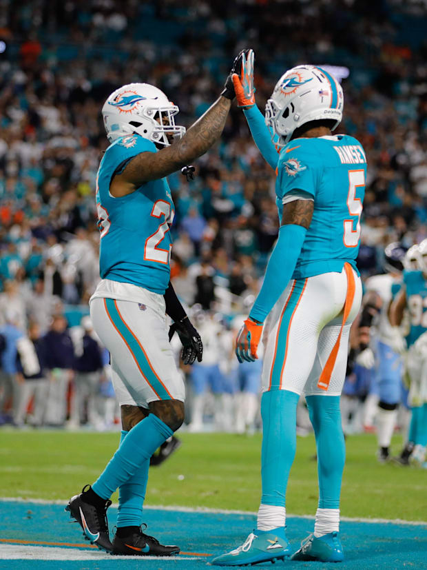 Miami Dolphins cornerback Xavien Howard (25) and cornerback Jalen Ramsey (5) celebrate.