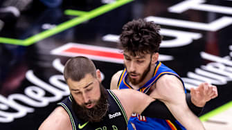 Apr 29, 2024; New Orleans, Louisiana, USA; New Orleans Pelicans center Jonas Valanciunas (17) drives into Oklahoma City Thunder forward Chet Holmgren (7) during game four of the first round for the 2024 NBA playoffs at Smoothie King Center. 