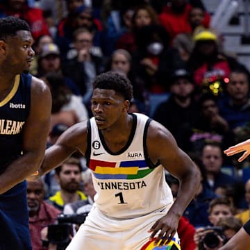 Dec 28, 2022; New Orleans, Louisiana, USA; New Orleans Pelicans forward Zion Williamson (1) looks to pass against Minnesota Timberwolves guard Anthony Edwards (1) during the second half at Smoothie King Center. Mandatory Credit: Stephen Lew-Imagn Images