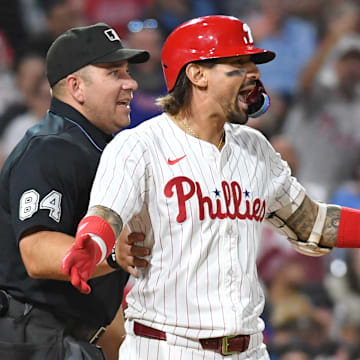 Sep 10, 2024; Philadelphia, Pennsylvania, USA; Philadelphia Phillies outfielder Nick Castellanos (8) reacts after getting hit by a pitch during the eighth inning against the Tampa Bay Rays at Citizens Bank Park.