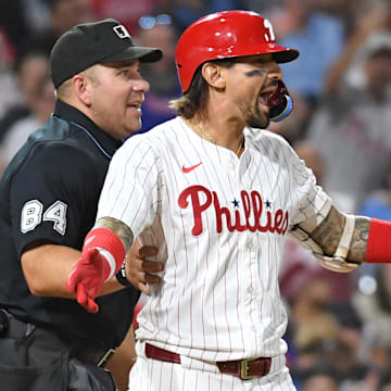 Sep 10, 2024; Philadelphia, Pennsylvania, USA; Philadelphia Phillies outfielder Nick Castellanos (8 )reacts after getting hit by a pitch during the eighth inning against the Tampa Bay Rays at Citizens Bank Park