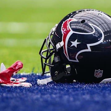 Sep 18, 2016; Houston, TX, USA; General view of a Houston Texans helmet and gloves before a game against the Kansas City Chiefs at NRG Stadium. Mandatory Credit: Troy Taormina-Imagn Images