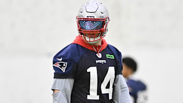  New England Patriots linebacker Robert Spillane (14) before the start of a drill at minicamp held in the WIN Field House at Gillette Stadium.
