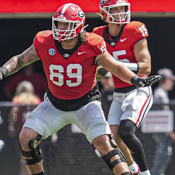 Sep 7, 2024; Athens, Georgia, USA; Georgia Bulldogs offensive lineman Tate Ratledge (69) blocks against the Tennessee Tech Golden Eagles during the first half at Sanford Stadium. Mandatory Credit: Dale Zanine-Imagn Images