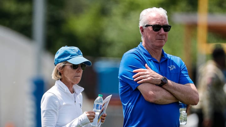 Detroit Lions principal owner and chair Sheila Ford Hamp watches practice with president and CEO Rod Wood.