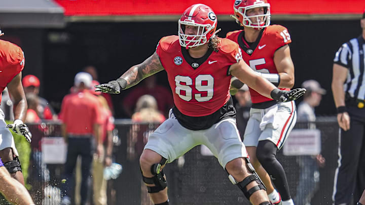 Sep 7, 2024; Athens, Georgia, USA; Georgia Bulldogs offensive lineman Tate Ratledge (69) blocks against the Tennessee Tech Golden Eagles during the first half at Sanford Stadium. Mandatory Credit: Dale Zanine-Imagn Images