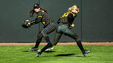Iowa's Tatianna Roman, left, fields a ball during a NCAA Big Ten Conference softball game against Nebraska, Tuesday, March 28, 2023, at Bob Pearl Field in Iowa City, Iowa.

230328 Nebraska Iowa Sb 058 Jpg