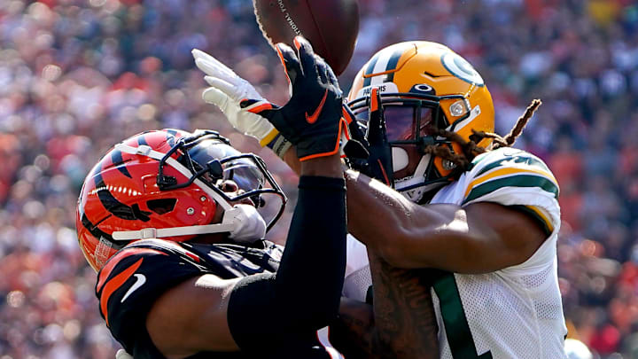 Green Bay Packers cornerback Eric Stokes (21) breaks up a pass intended for Cincinnati Bengals receiver Ja'Marr Chase in 2021. Green Bay Packers cornerback Eric Stokes (21) breaks up a pass intended for Cincinnati Bengals receiver Ja'Marr Chase in 2021.