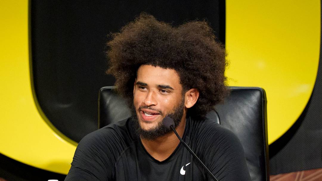 Oregon quarterback Dante Moore speaks during a press conference on Aug. 18, 2026, at the Hatfield-Dowlin Complex in Eugene, Oregon 