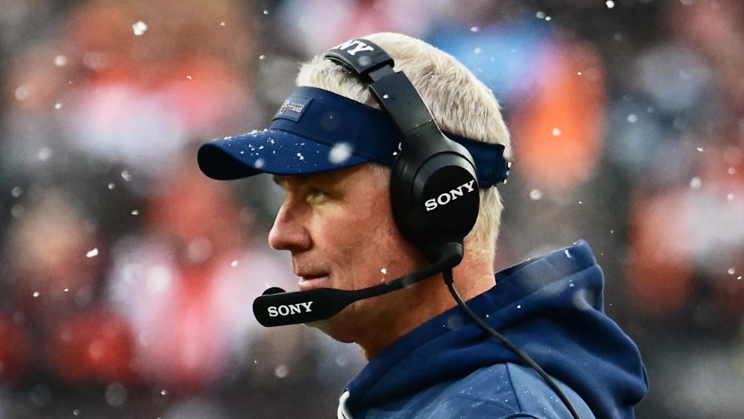 Tennessee Titans interim head coach Mike McCoy watches game play against the Cleveland Browns.