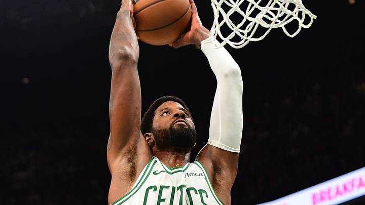Oct 10, 2026; Boston, Massachusetts, USA;  Boston Celtics forward Paul George (13) dunks the ball during the second half against the Philadelphia 76ers at TD Garden. Mandatory Credit: Bob DeChiara-Imagn Images