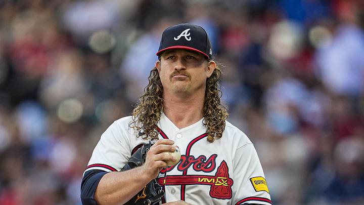 Jun 3, 2026; Cumberland, Georgia, USA; Atlanta Braves pitcher Grant Holmes (66) looks at the runners on base against the Toronto Blue Jays during the first inning at Truist Park. Mandatory Credit: Dale Zanine-Imagn Images