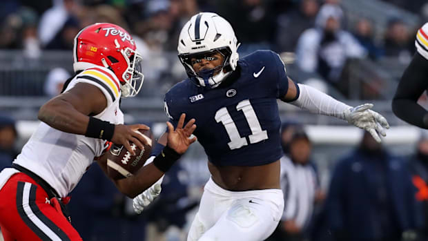 Penn State Nittany Lions defensive end Abdul Carter (11) pressures Maryland Terrapins quarterback MJ Morris