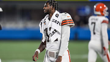 Aug 8, 2025; Charlotte, North Carolina, USA; Cleveland Browns quarterback Shedeur Sanders (12) greets teammates coming off the field after a touchdown drive against the Carolina Panthers during the second half at Bank of America Stadium. Mandatory Credit: Jim Dedmon-Imagn Images