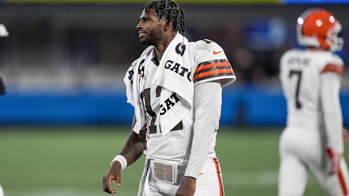 Aug 8, 2025; Charlotte, North Carolina, USA; Cleveland Browns quarterback Shedeur Sanders (12) greets teammates coming off the field after a touchdown drive against the Carolina Panthers during the second half at Bank of America Stadium. Mandatory Credit: Jim Dedmon-Imagn Images