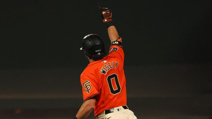 Jun 28, 2024; San Francisco, California, USA; San Francisco Giants second baseman Brett Wisely (0) celebrates as he rounds the bases on a two-run home run for a walk-off win against the Los Angeles Dodgers during the ninth inning at Oracle Park
