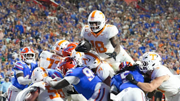 Tennessee running back DeSean Bishop (18) scores a touchdown during the NCAA college football game against Florida on November 22, 2025, in Gainesville, Florida.