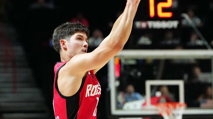 Jul 14, 2024; Las Vegas, NV, USA; Houston Rockets guard Reed Sheppard (15) shoots against the Washington Wizards during the third quarter at Thomas & Mack Center. Mandatory Credit: Stephen R. Sylvanie-Imagn Images