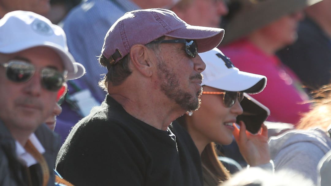 Larry Ellison and his wife Jolin  watch Novak Djokovic 