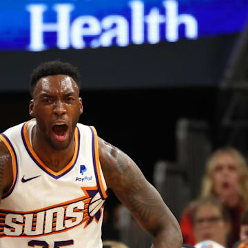 Nov 22, 2023; Phoenix, Arizona, USA; Phoenix Suns forward Nassir Little (25) celebrates a play against the Golden State Warriors in the first half at Footprint Center. Mandatory Credit: Mark J. Rebilas-Imagn Images