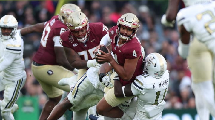 Aug 24, 2024; Dublin, IRL; Georgia Tech defensive lineman Kevin Harris II tackles Florida State University quarterback DJ Uiagalelei at Aviva Stadium. Mandatory Credit: Tom Maher/INPHO via USA TODAY Sports