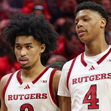Mar 9, 2025; Piscataway, New Jersey, USA; Rutgers Scarlet Knights guard Dylan Harper (2) and Rutgers Scarlet Knights guard Ace Bailey (4) during a time out during the second half against the Minnesota Golden Gophers at Jersey Mike's Arena. Mandatory Credit: Vincent Carchietta-Imagn Images