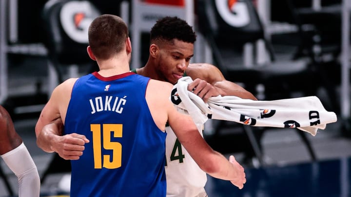 Feb 8, 2021; Denver, Colorado, USA; Denver Nuggets center Nikola Jokic (15) greets Milwaukee Bucks forward Giannis Antetokounmpo (34) after the game at Ball Arena. Mandatory Credit: Isaiah J. Downing-USA TODAY Sports