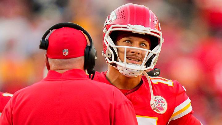 Kansas City Chiefs quarterback Patrick Mahomes talks with head coach Andy Reid.