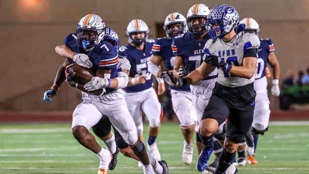 DJ Dugar (7) fends off a defender in a Texas high school football loss to Georgetown on Oct. 27 at Bible Stadium. 