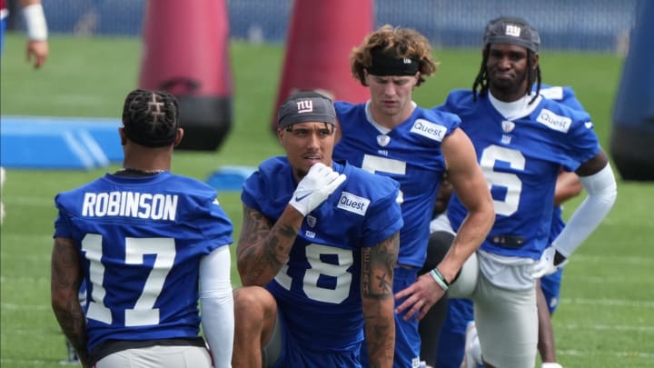 East Rutherford, NJ -- June 11, 2024 -- Wide receivers WanÕDale Robinson, Isaiah Hodgins, Chase Coat, and Bryce Ford-Wheaton at the NY Giants Mandatory Minicamp at their practice facility in East Rutherford, NJ.