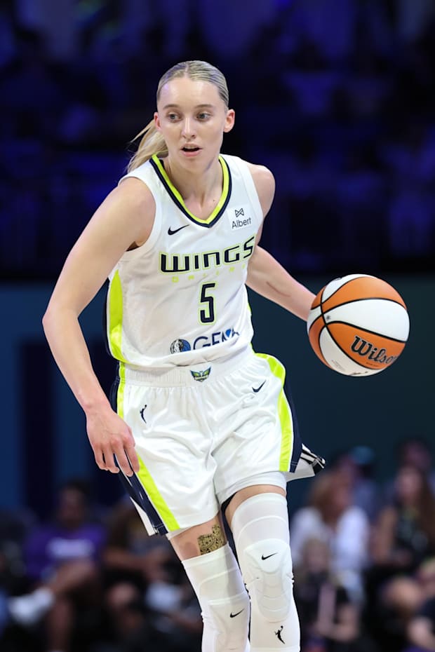 Dallas Wings guard Paige Bueckers dribbles against the Phoenix Mercury