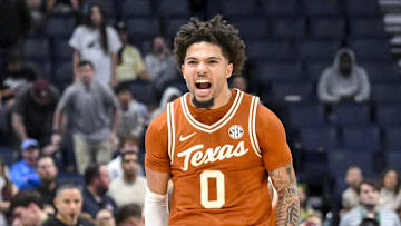 Mar 13, 2025; Nashville, TN, USA;  Texas Longhorns guard Jordan Pope (0) reacts after the double over time win against the Texas A&M Aggies during the second half at Bridgestone Arena. Mandatory Credit: Steve Roberts-Imagn Images