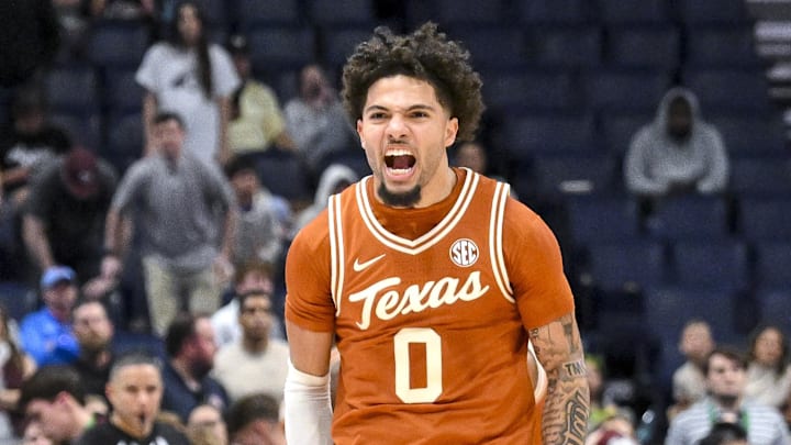Mar 13, 2025; Nashville, TN, USA;  Texas Longhorns guard Jordan Pope (0) reacts after the double overtime win against the Texas A&M Aggies during the second half at Bridgestone Arena.