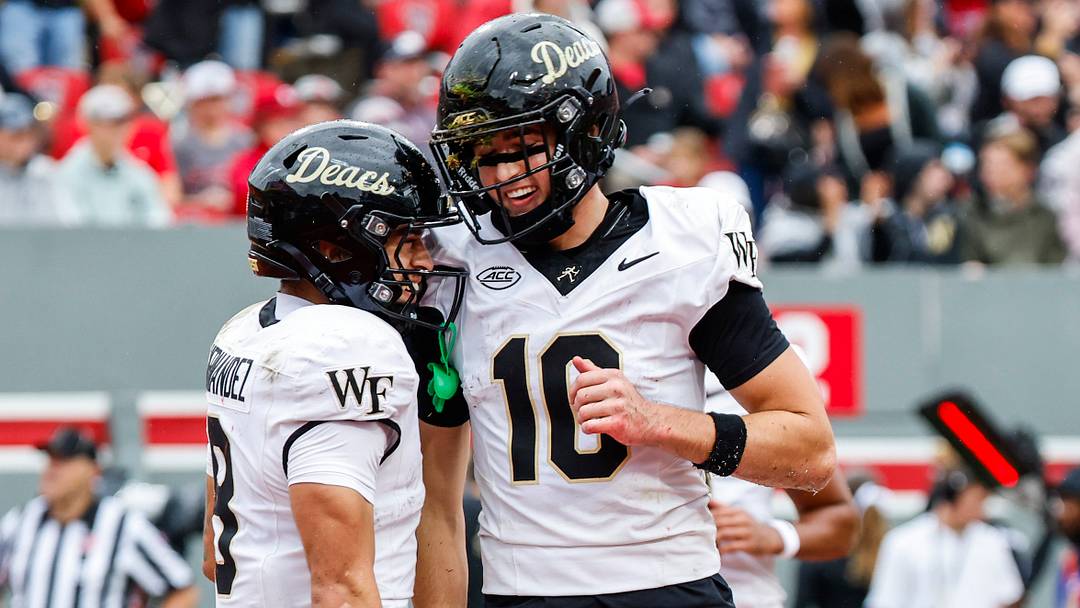 Demon Deacons wide receiver Jack Foley (10) celebrates a touchdown with wide receiver Carlos Hernandez (8) Mandatory Credit: Jaylynn Nash-Imagn Images