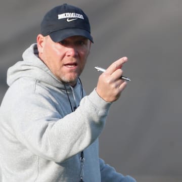 Purdue Boilermakers head coach Barry Odom looks down field 