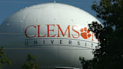 A water tower on State Highway 123 in Seneca entering the North end of Clemson University is branded with a logo, and trademark tiger paw.