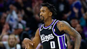 Nov 11, 2025; Sacramento, California, USA; Sacramento Kings guard Malik Monk (0) celebrates after scoring a basket during the first quarter against the Denver Nuggets at Golden 1 Center.
