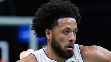 Detroit Pistons guard Cade Cunningham drives the ball against the Boston Celtics.