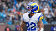 Nov 30, 2025; Charlotte, North Carolina, USA; Los Angeles Rams running back Blake Corum (22) celebrates after scoring a touchdown during the second quarter against the Carolina Panthers at Bank of America Stadium. Mandatory Credit: Jim Dedmon-Imagn Images