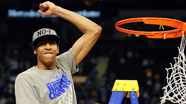 Apr 2, 2012; New Orleans, LA, USA; Kentucky Wildcats forward Anthony Davis waves to the crowd after cutting down a piece of the net after the finals of the 2012 NCAA men's basketball Final Four against the Kansas Jayhawks at the Mercedes-Benz Superdome. Kentucky won 67-59. Mandatory Credit: Bob Donnan-USA TODAY Sports
