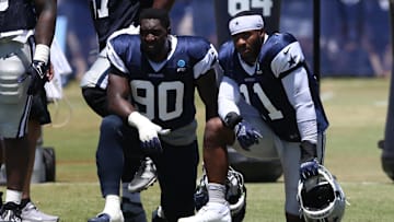 Dallas Cowboys defensive end DeMarcus Lawrence and linebacker Micah Parsons during training camp at the River Ridge Playing Fields in Oxnard, California. 