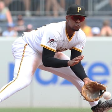 Jul 2, 2025; Pittsburgh, Pennsylvania, USA;  Pittsburgh Pirates third baseman Ke'Bryan Hayes (13) fields a ground ball for an out against St. Louis Cardinals third baseman Thomas Saggese (not pictured) during the sixth inning at PNC Park. Mandatory Credit: Charles LeClaire-Imagn Images