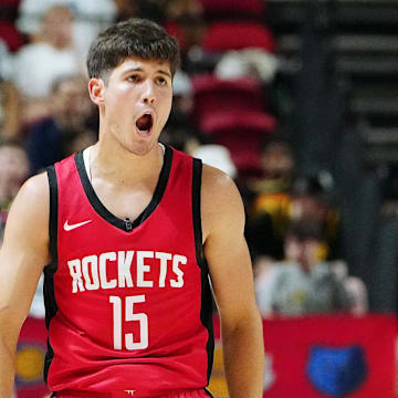 Jul 14, 2024; Las Vegas, NV, USA; Houston Rockets guard Reed Sheppard (15) reacts after scoring against the Washington Wizards during the third quarter at Thomas & Mack Center. Mandatory Credit: Stephen R. Sylvanie-Imagn Images