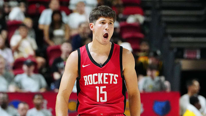 Jul 14, 2024; Las Vegas, NV, USA; Houston Rockets guard Reed Sheppard (15) reacts after scoring against the Washington Wizards during the third quarter at Thomas & Mack Center. Mandatory Credit: Stephen R. Sylvanie-Imagn Images