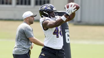Jun 11, 2025; Baltimore, MD, USA; Baltimore Ravens linebacker Chandler Martin (48) makes a catch during an NFL OTA at Under Armour Performance Center. Mandatory Credit: Daniel Kucin Jr.-Imagn Images